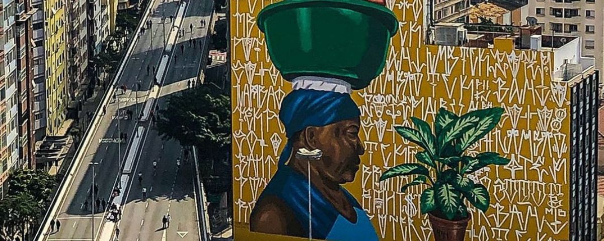 Maior mural de arte urbana do país com 1.882 metros quadrados de altura, chamado de “Deus é mãe”, feito por Robinho Santana. 